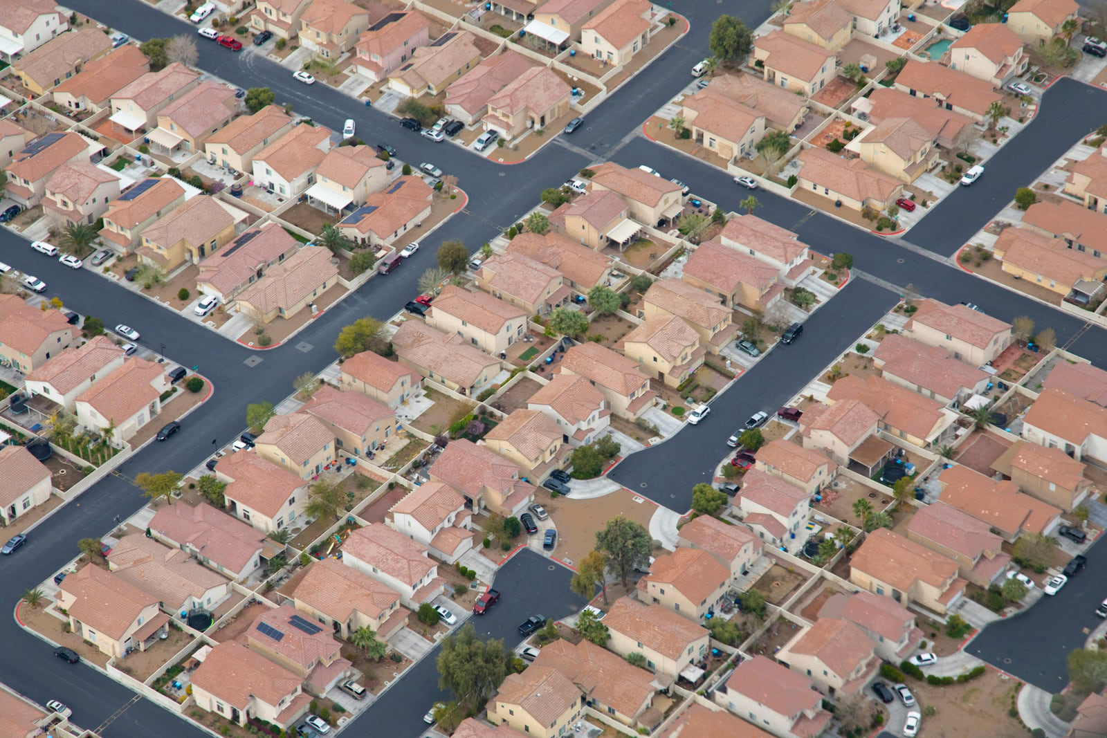 An aerial view of a Las Vegas residential neighborhood with closely spaced homes.