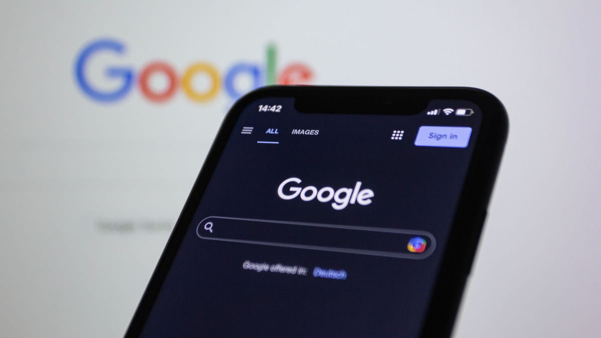 A smartphone displaying Google's search page.